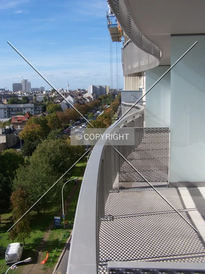 The undulating balconies and maintenance gantry