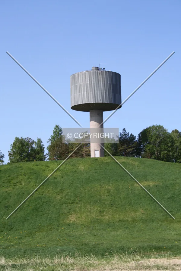 Water tower on a hill