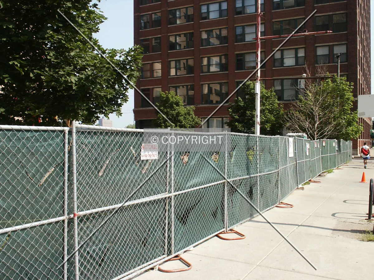 Looking south along the Wells Street fence