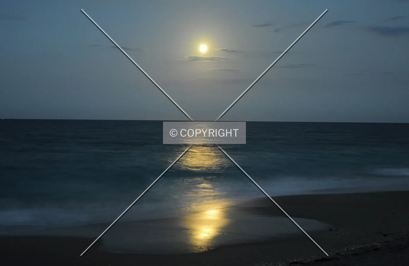 Full moon over the beach along Ocean Boulevard