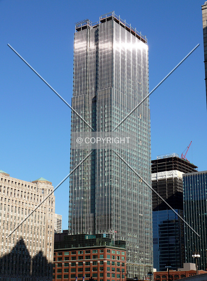 View to the northeast from the Chicago River with 353 North Clark under construction to the east