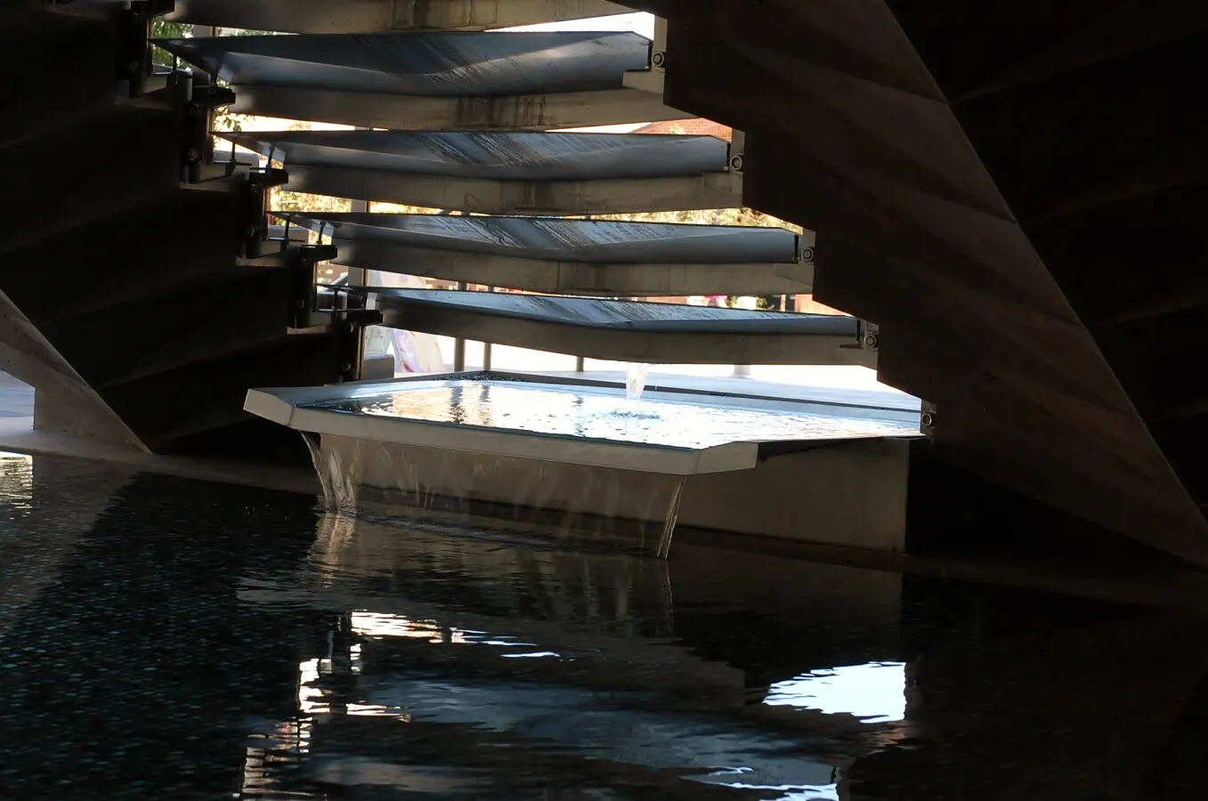 Water running into the infinity edge fountain