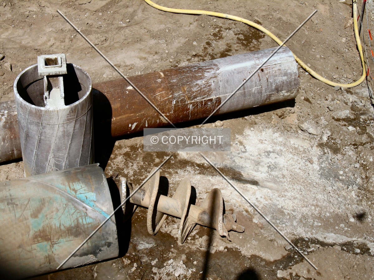 Caisson tubes and drill bit at rest