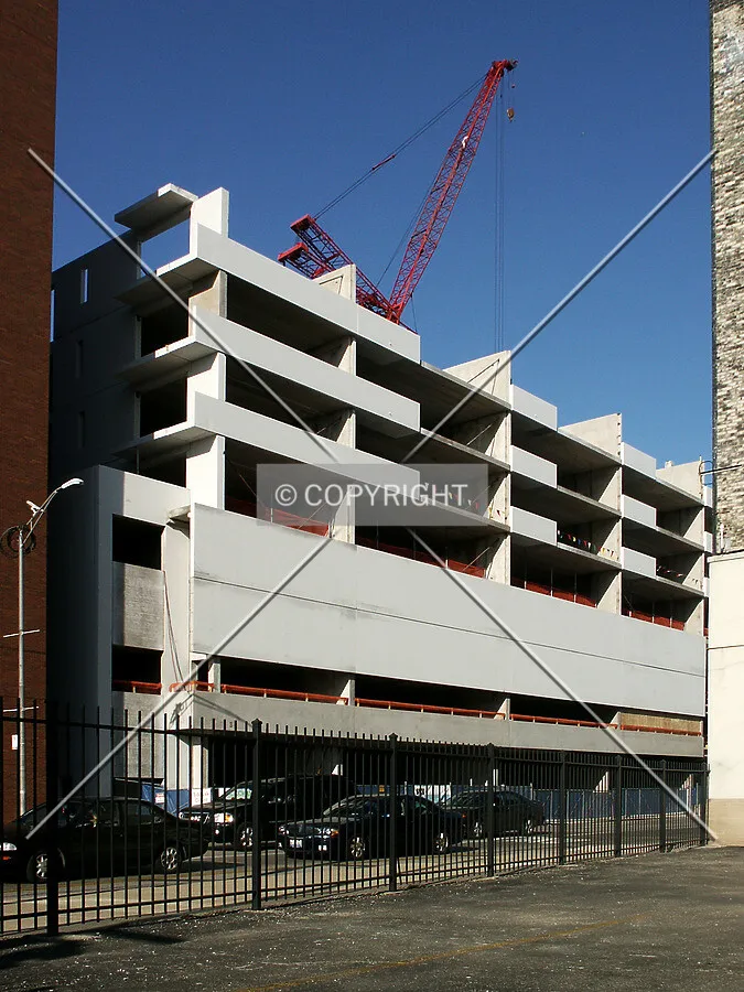 Looking northeast from Orleans Street between two neighboring buildings