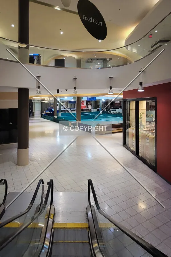 Escalator from the second floor to the food court; October 26, 2023