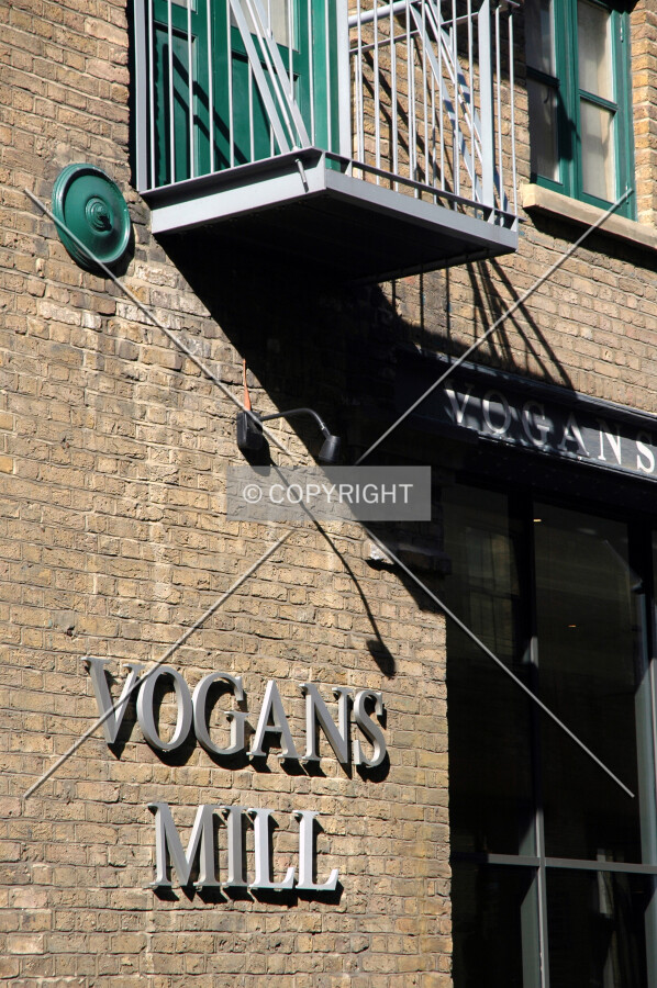 The entrance is provided at street level through a former warehouse