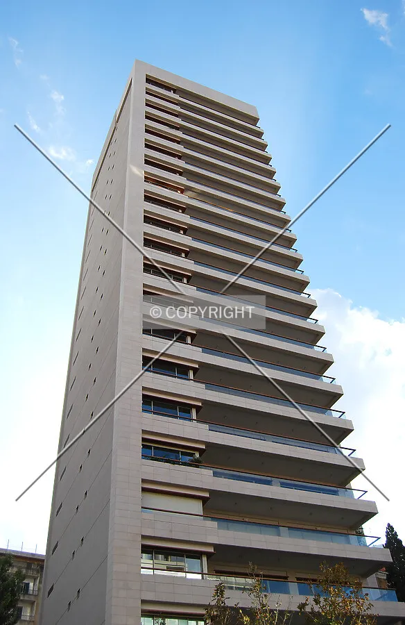 Looking up from Omar Daouk Street