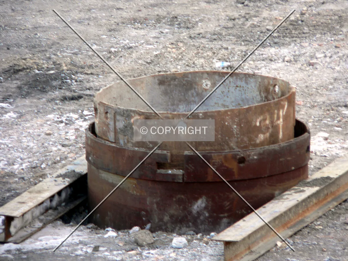 Caisson hole with an embedded top and liner visible