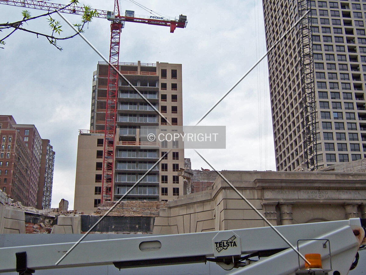 Looking north from Oak Street, across the demolition underway for 30 West Oak
