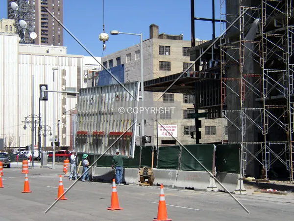 About to erect one of the tower's facade panels