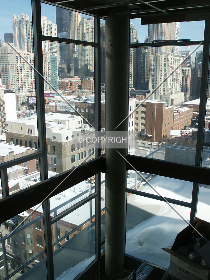 Looking northeast from the 15th floor before installation of privacy wall over the 14th floor atrium