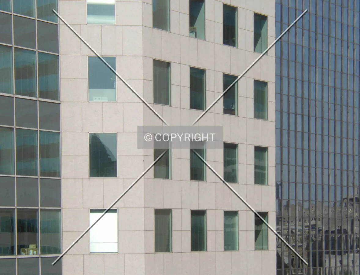 The eastern facade contrasts with that of the neighboring AmSouth Center