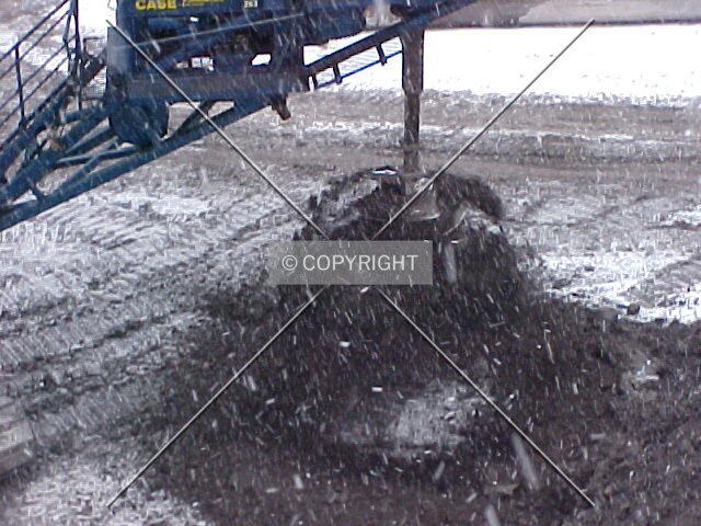 Spinning the dirt off the caisson drill bit