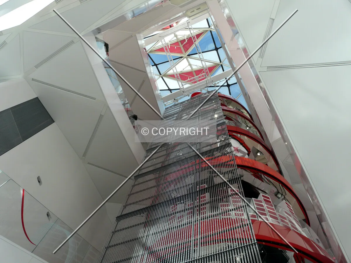 Looking up the central void from the ground floor