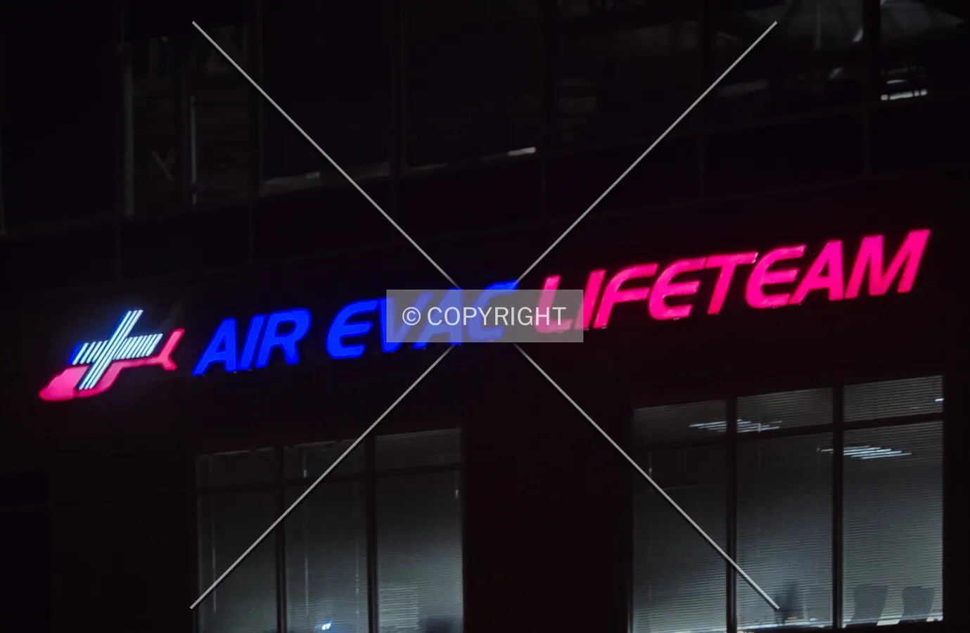 Sign at night; October 30, 2024