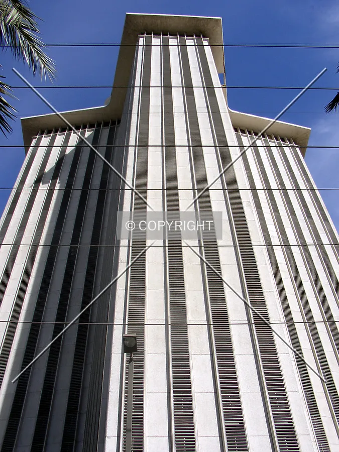 Looking up the western façade from Convention Center Boulevard