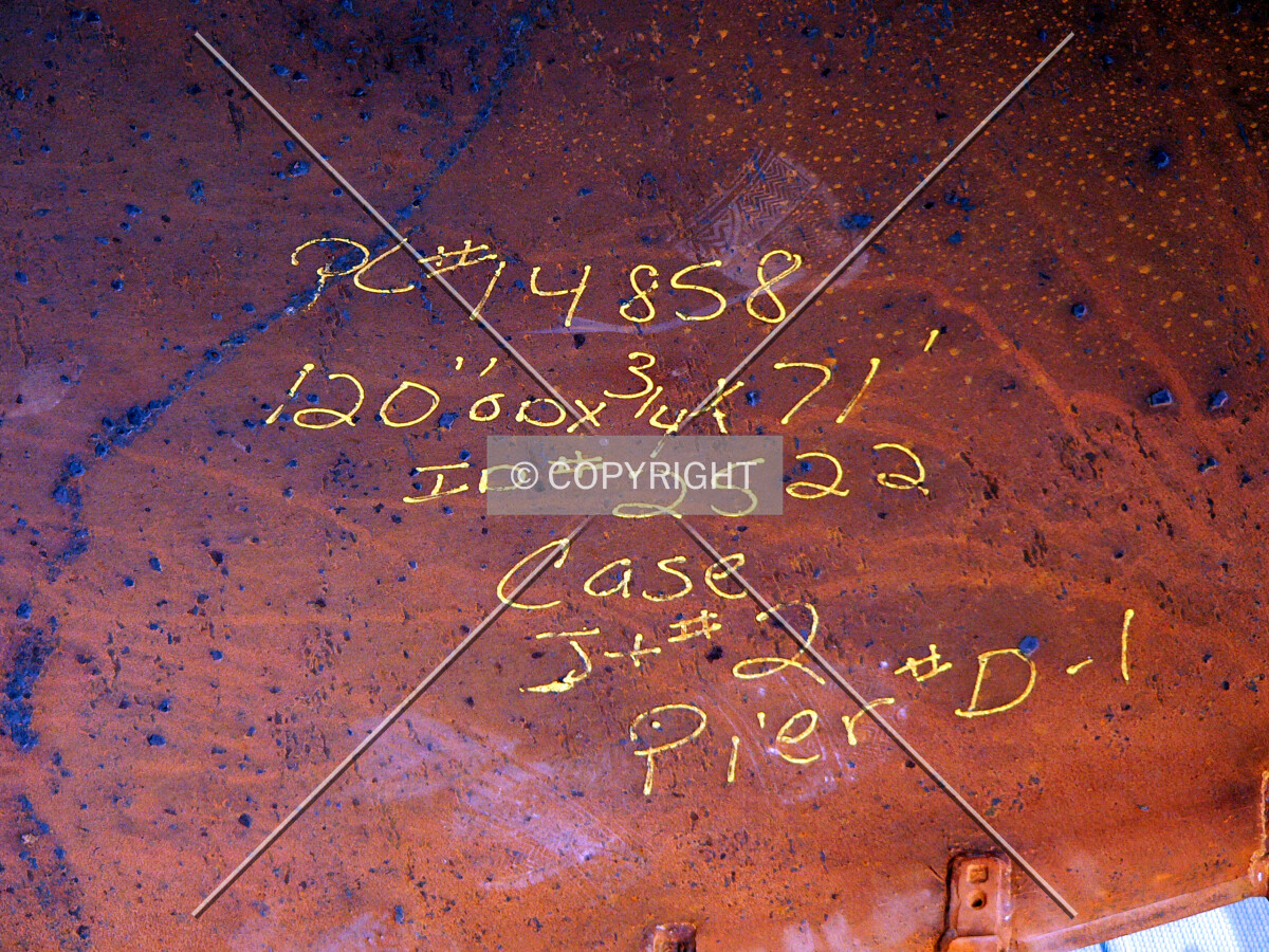 Identification markings within a caisson rock can