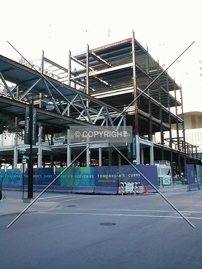 Steel crossing the street to the Prentice Women's Hospital construction site