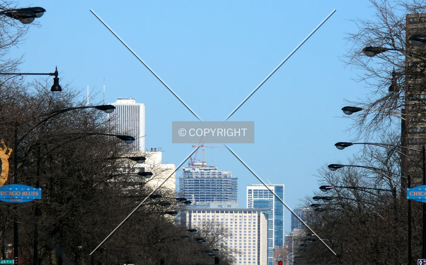 View to the north down King Drive from 47th Street with the crane and core of Aqua visible