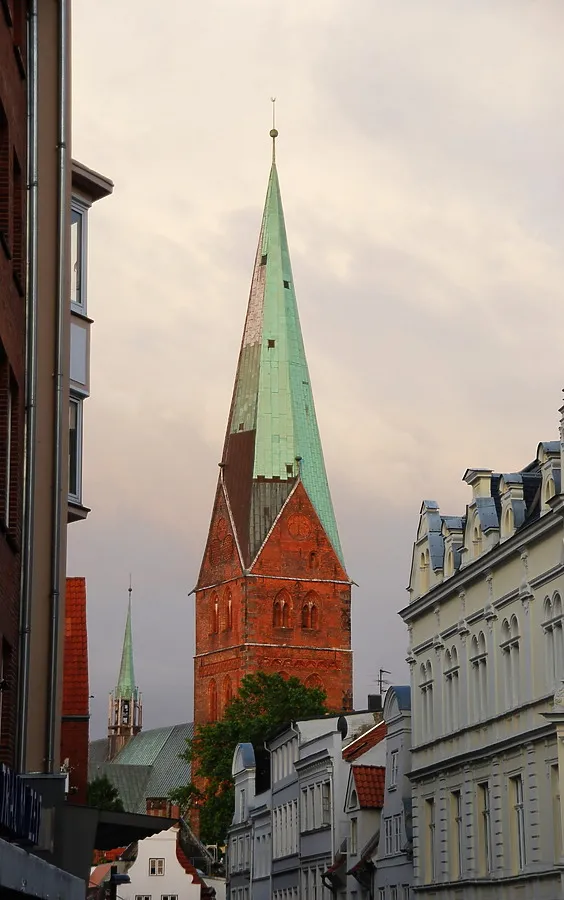The spire rising above the surrounding rooftops
