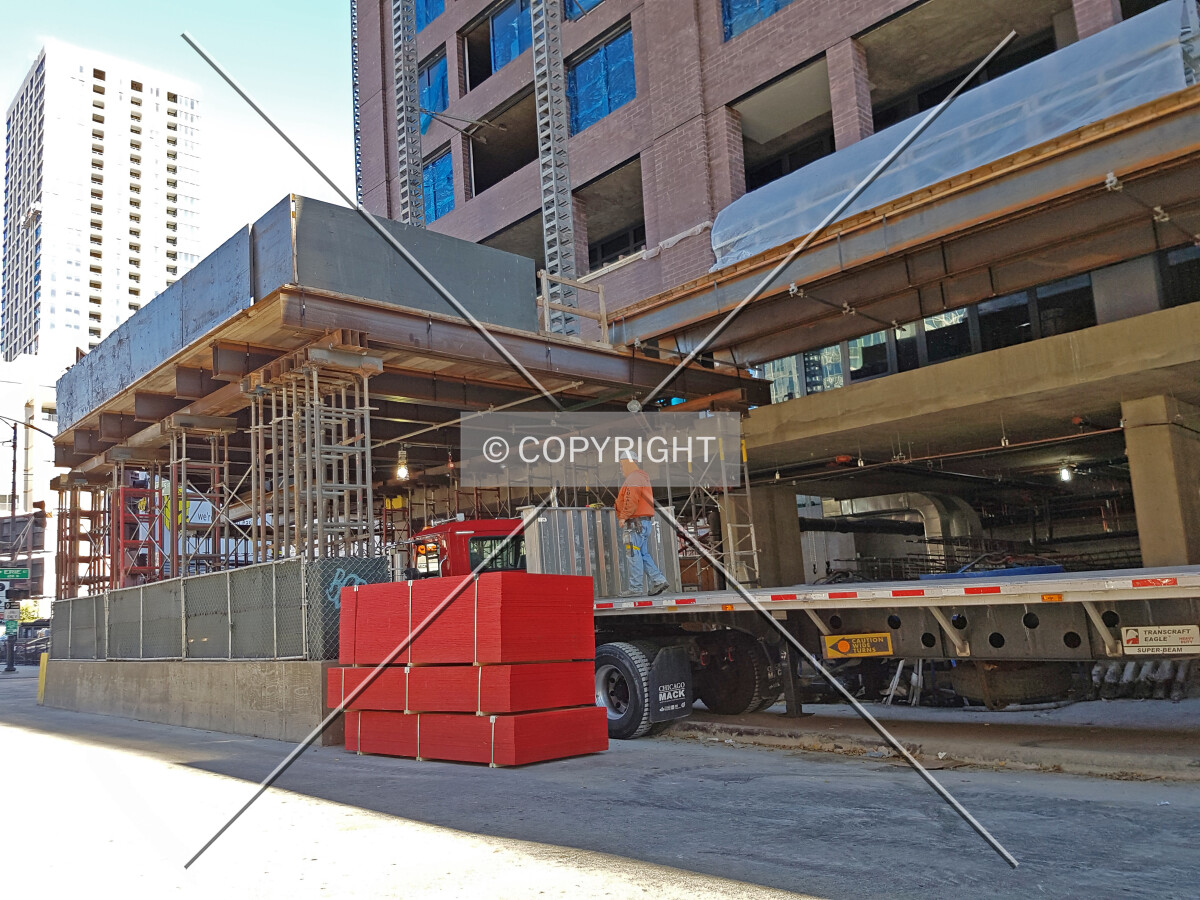 Construction trailer in front of the site