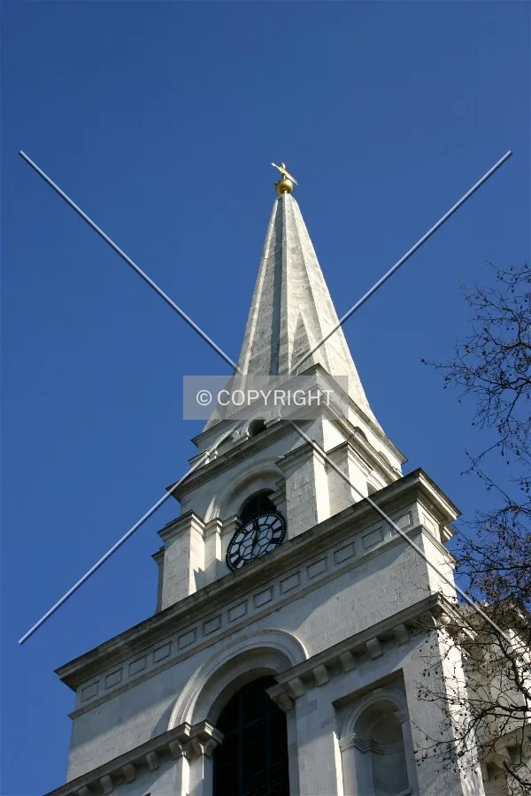 Looking up at the spire and clock face from Commercial Street