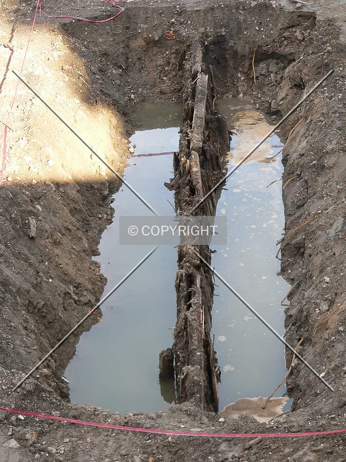 A row of old wooden piles