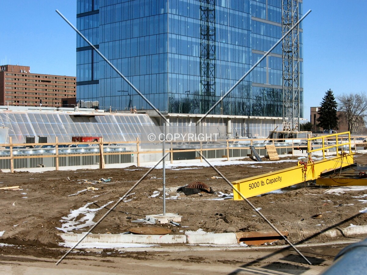 View to the northeast across the site, one-level common lobby on the left