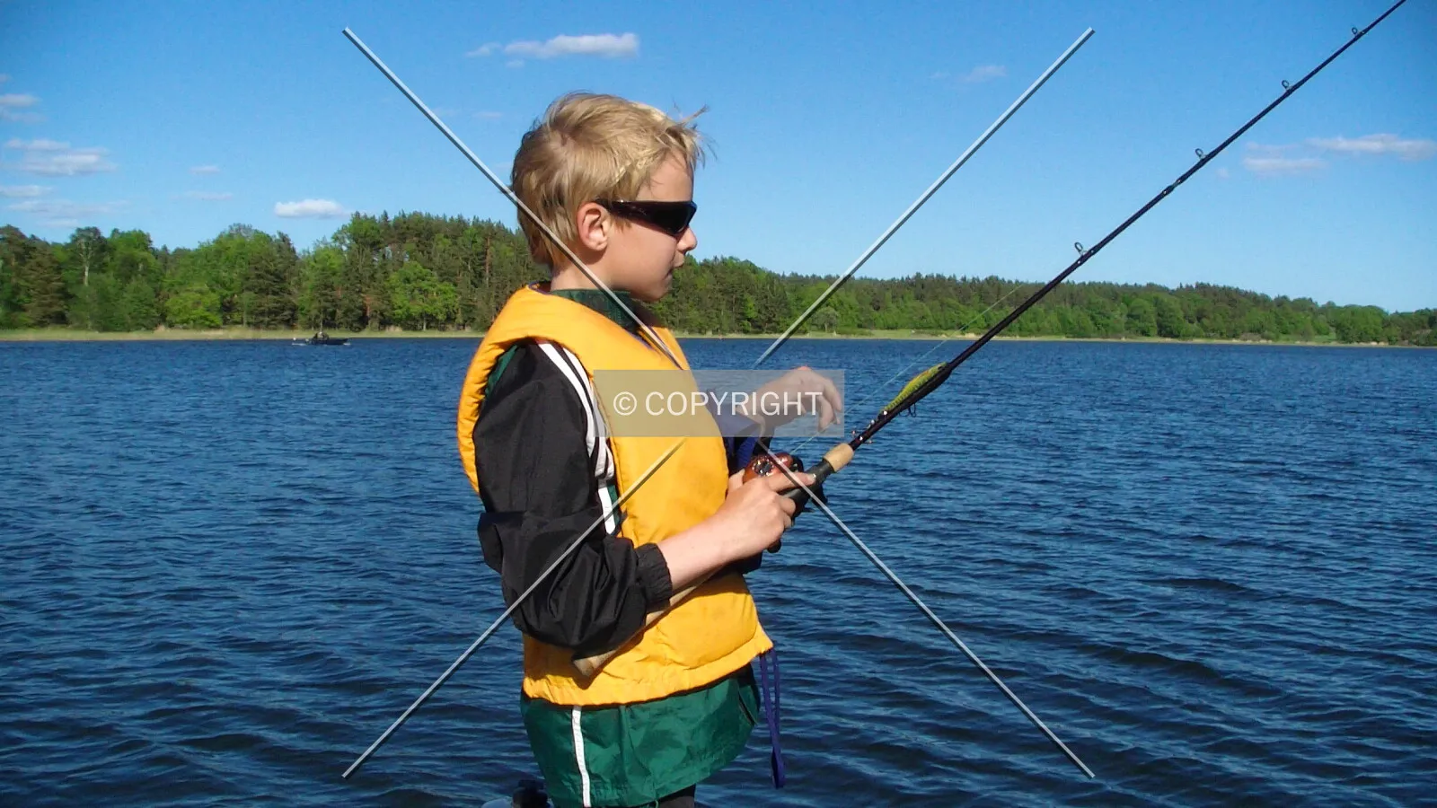 A boy is fishing