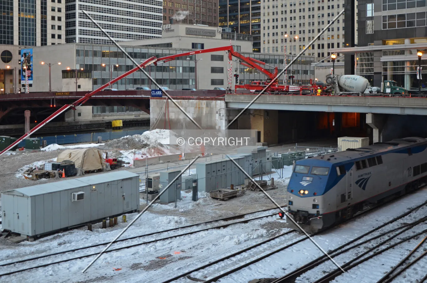 Concrete pump boom extended from Randolph Street during the foundation mat pour on a very cold day; February 14, 2015.