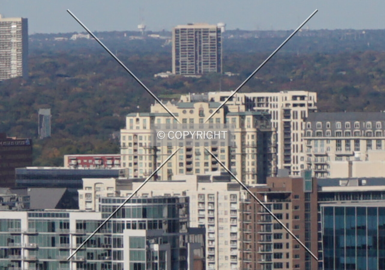 Distant view of the upper floors from the southeast; November 18, 2021