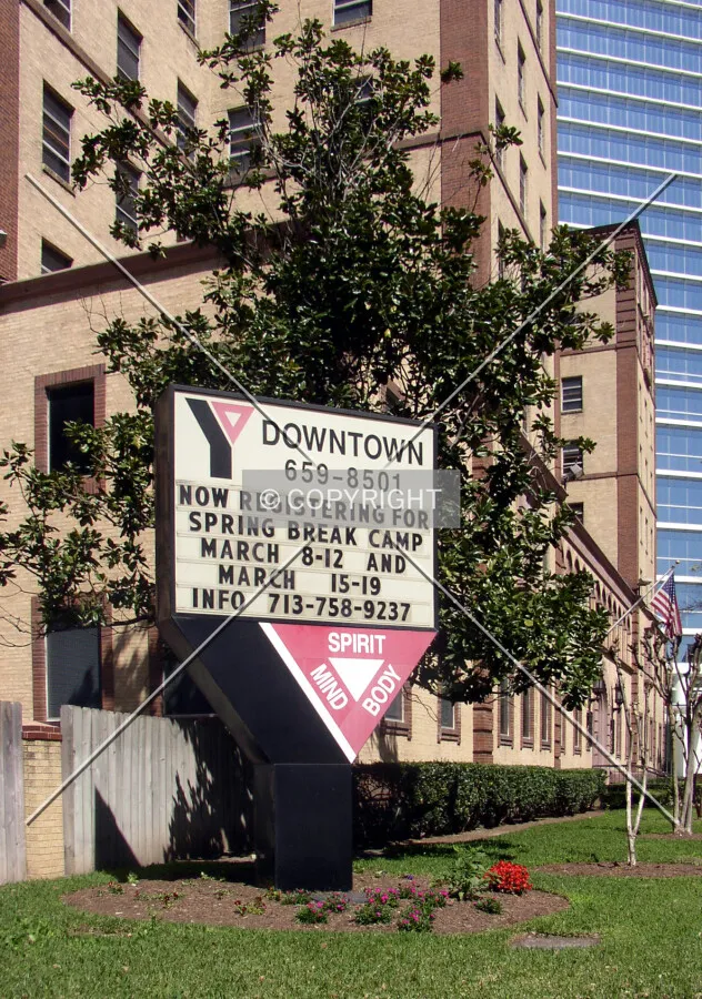 Signage at the corner of Pease and Louisiana Streets