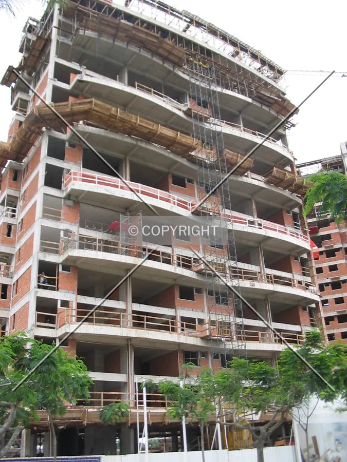 During the construction of the last floor of the structure