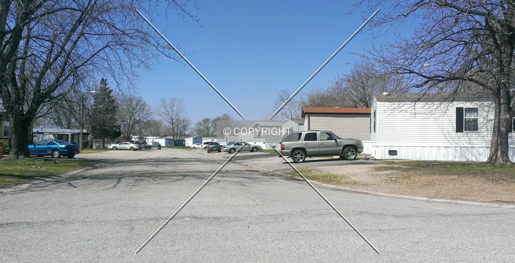View west along Village Lane; April 5, 2014