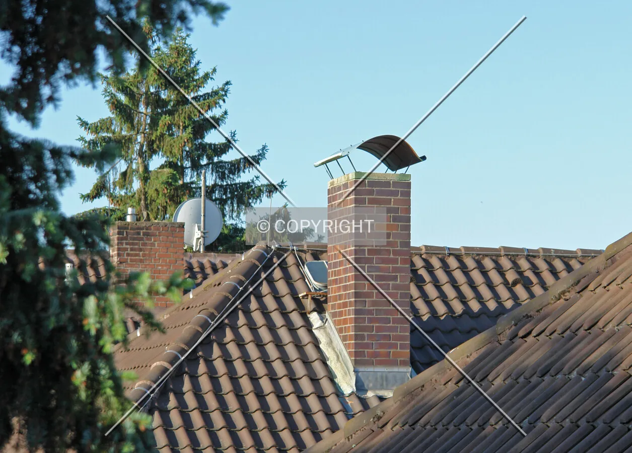 A brick chimney on a house