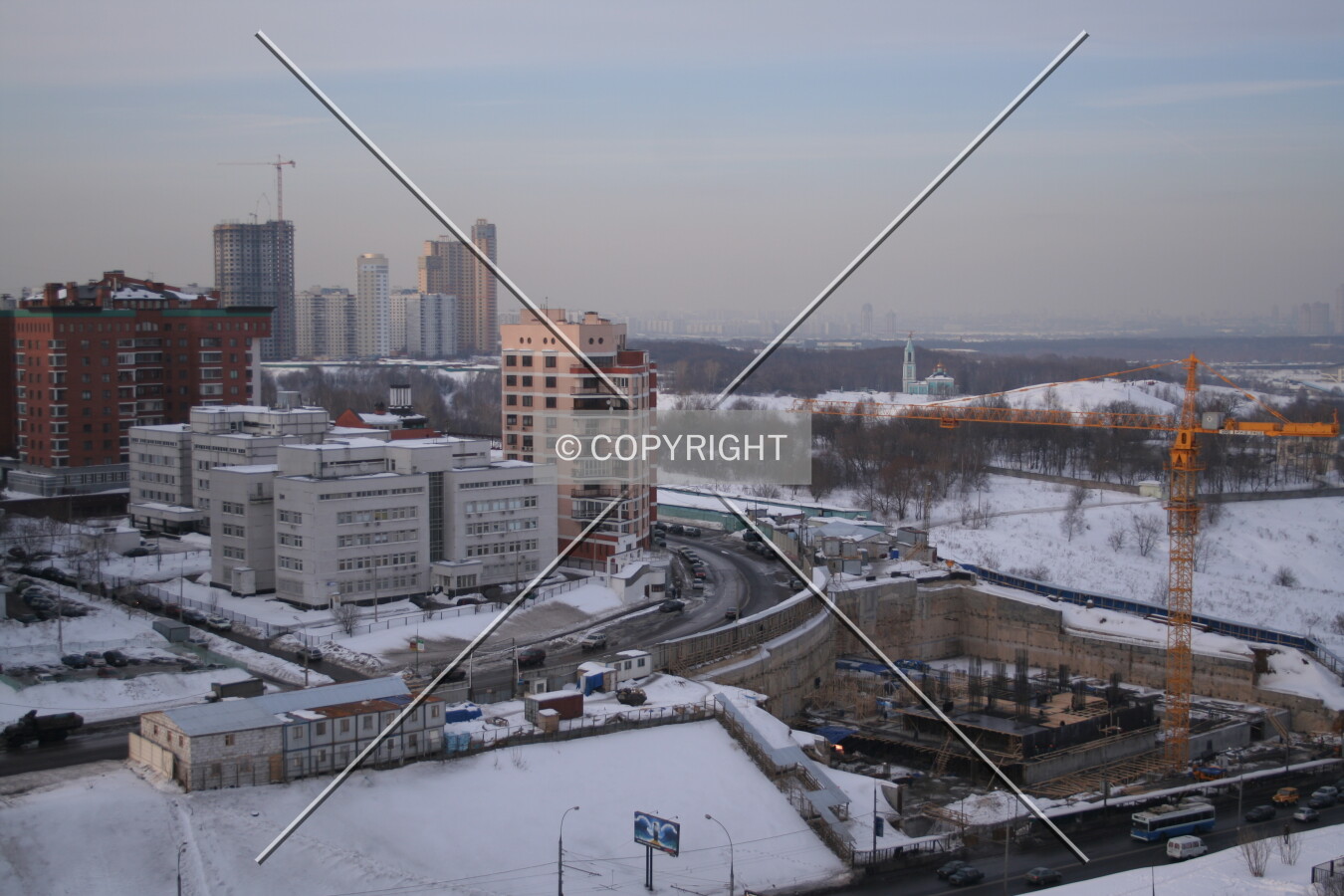 The construction is seen on the right and on top of the hill to the left the construction management is situated