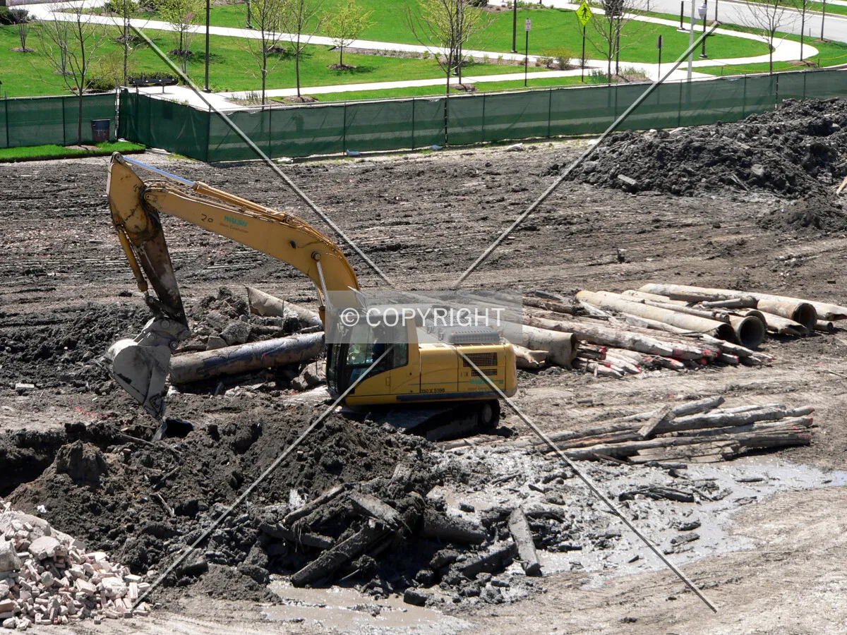 Excavation and removal of burried debris