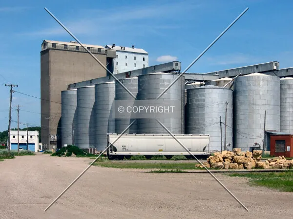 View to the north from the University of Minnesota Transitway, rising beyond steel grain bins