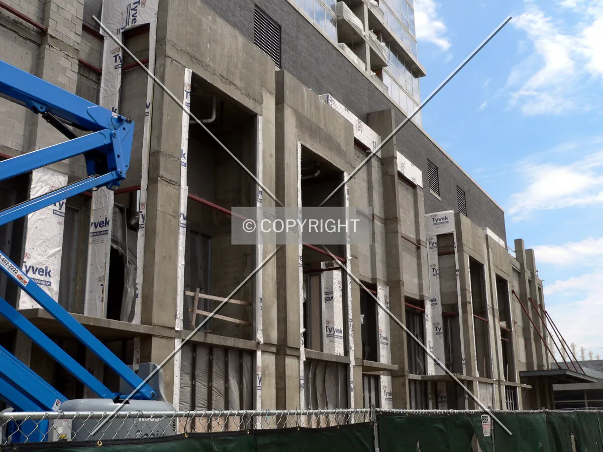 Row of unfinished townhomes along the western base