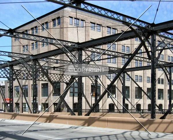 South corner from the Washington Avenue North railroad bridge