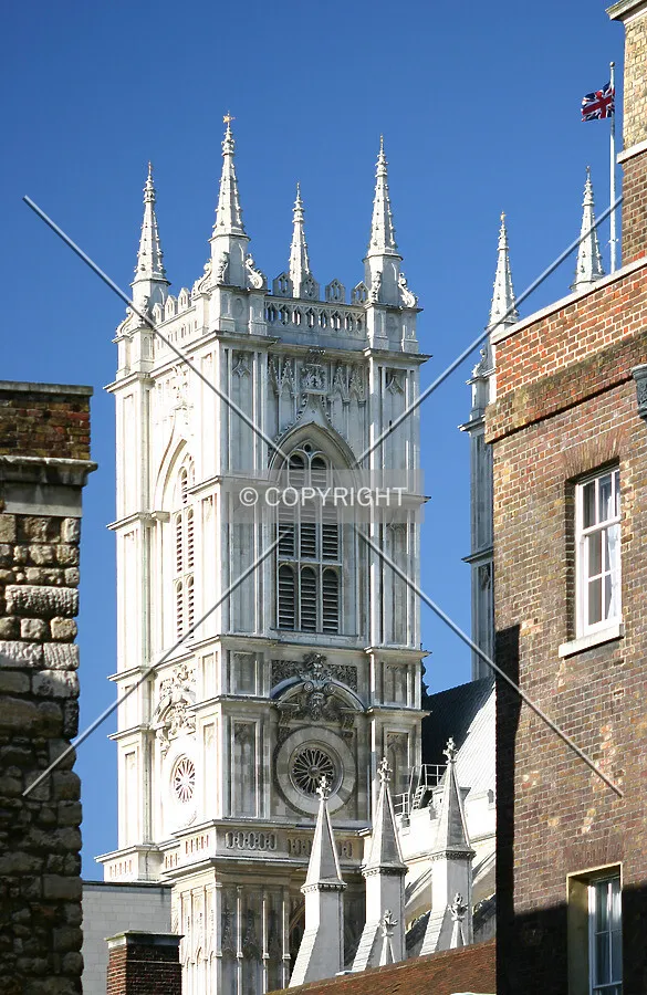 View west through adjacent buildings of the south tower from St. Margaret Street