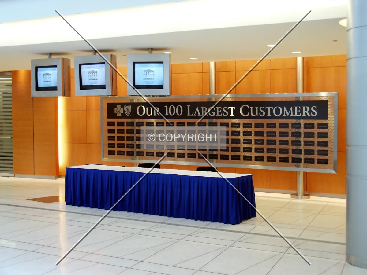 Plaque on the lower level dedicated to customers