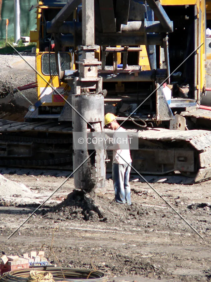 Emptying dirt from a bucket tool