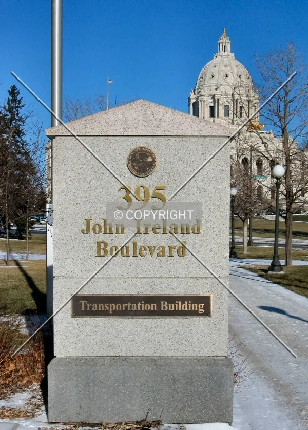 Sign with State Capitol