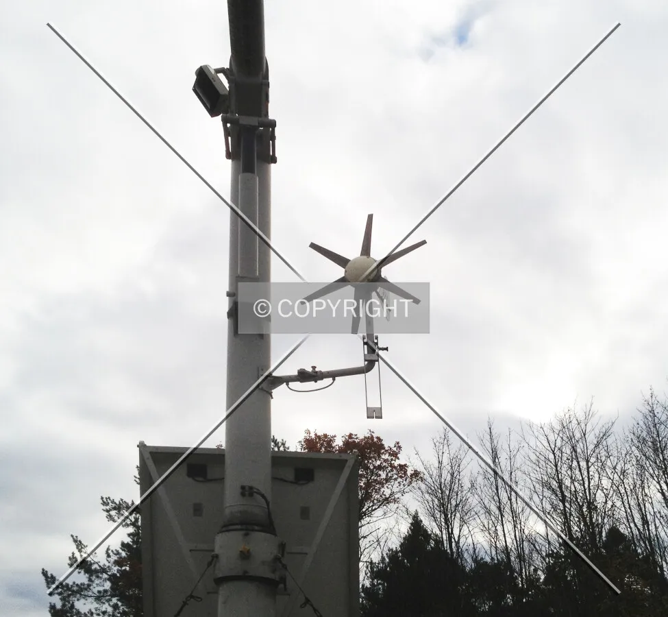 A gantry powered by wind featuring a toll collect tracking device