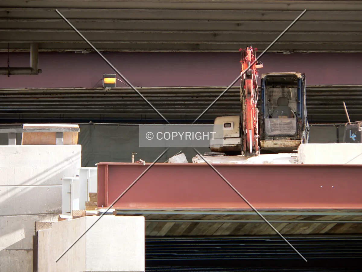 Demolishing the concrete barrier in preparation for building the southbound exit ramp off of lower Lake Shore Drive