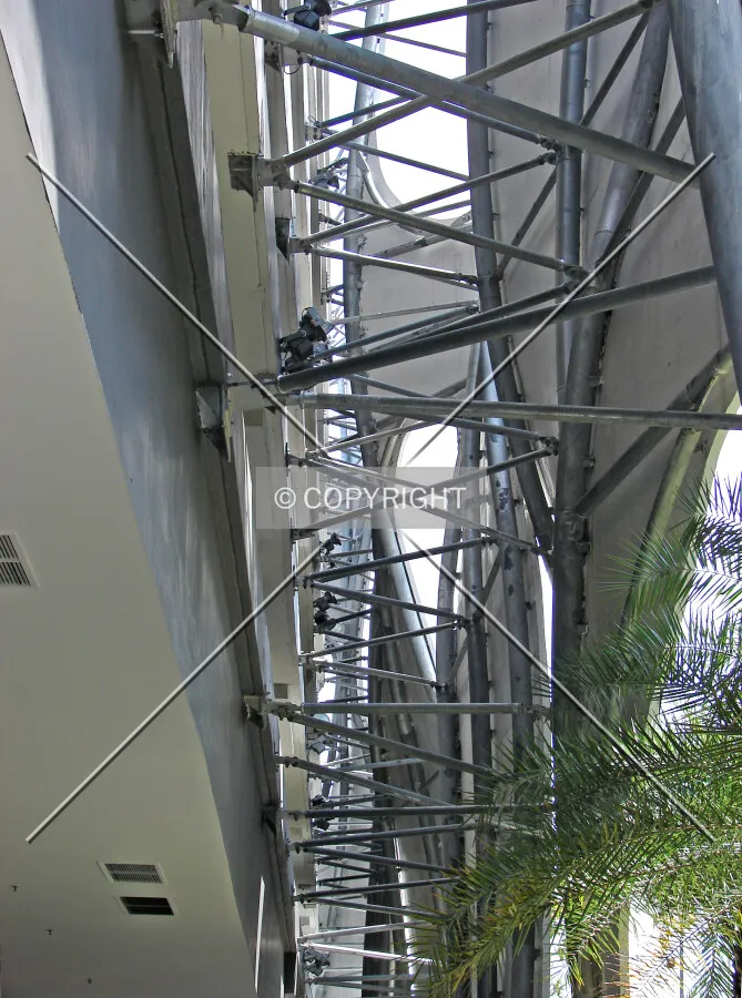 View of the attachment system between the car park and the undulating facade panels