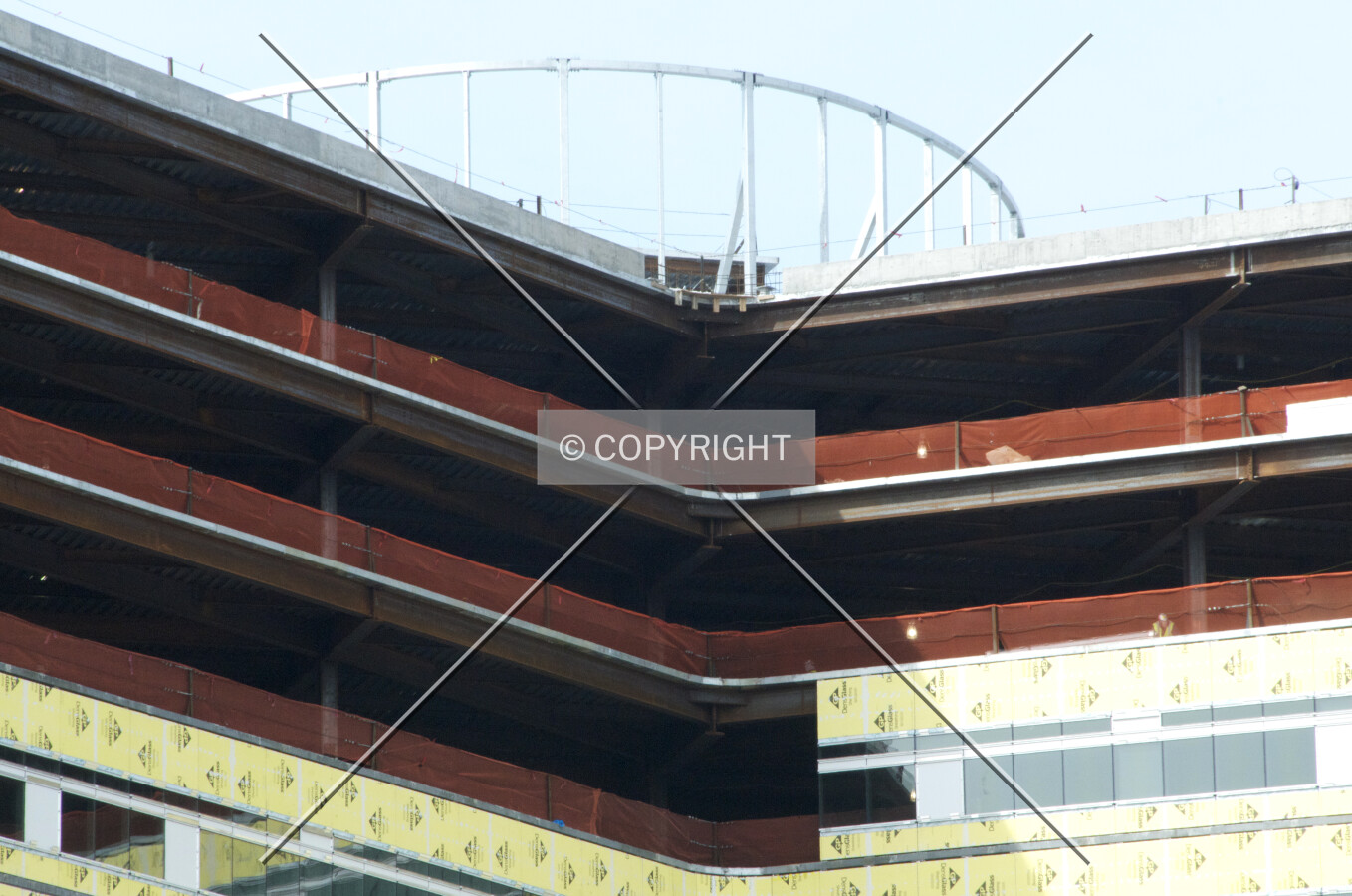 Upper floors and frame for the mechanical penthouse screen, viewed from the east