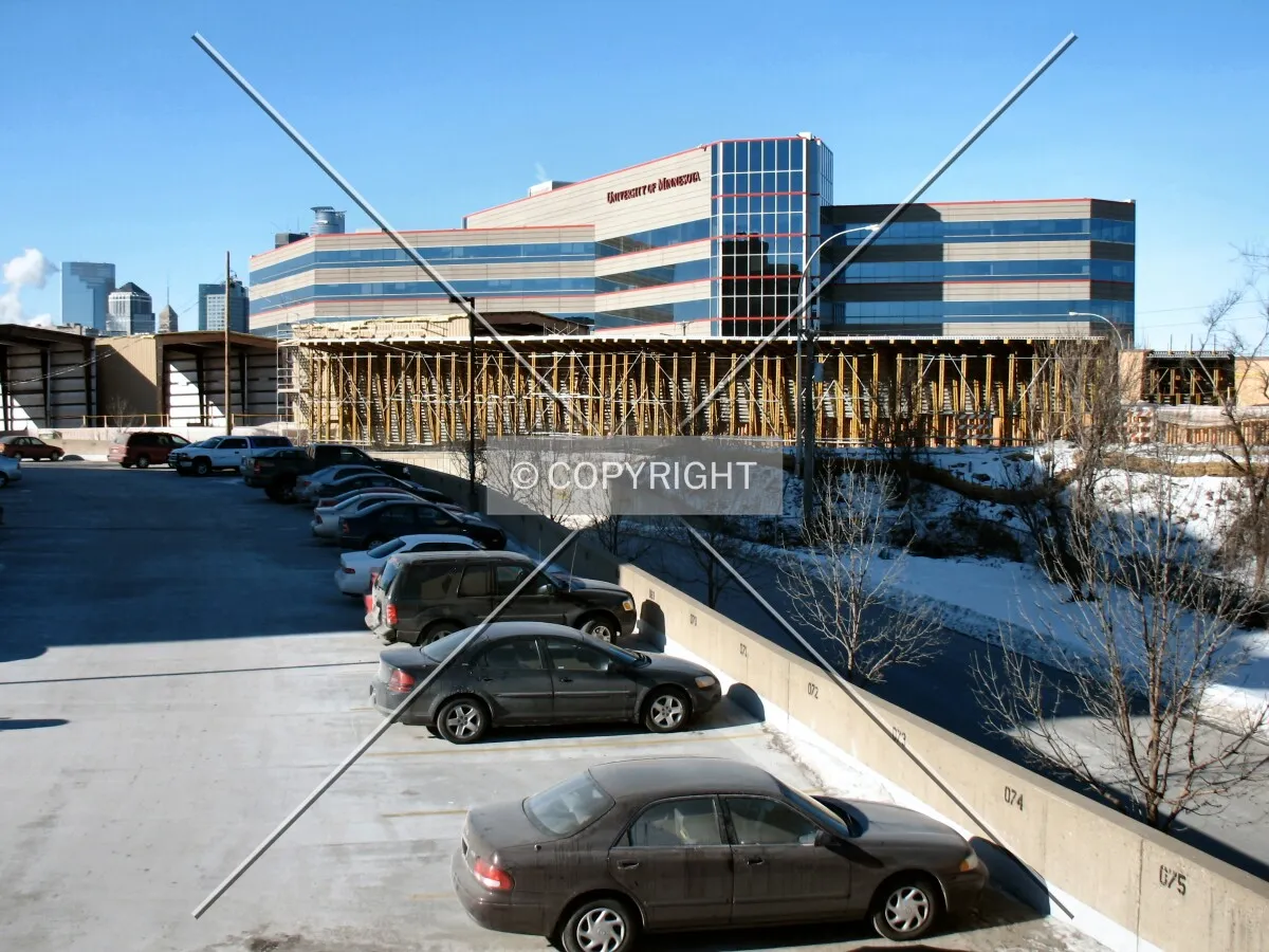 Construction staging on the south approach, with the West Bank Office Building