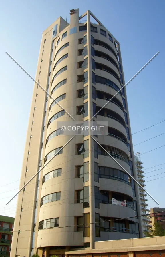 Looking up from across Gaspar Martins Street